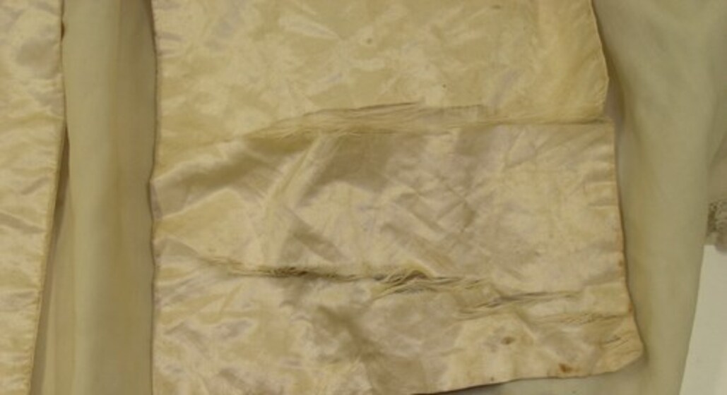 Detail of split satin before treatment 