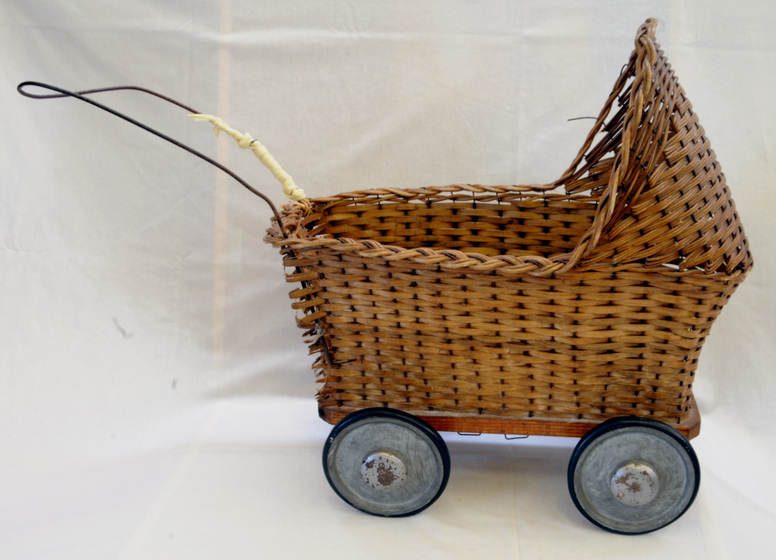 Wicker pram with wire handle and metal wheels