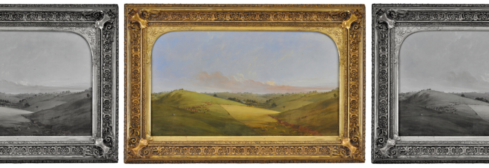 rolling grassy hills with a homestead in the distance and a flock of sheep in the foreground