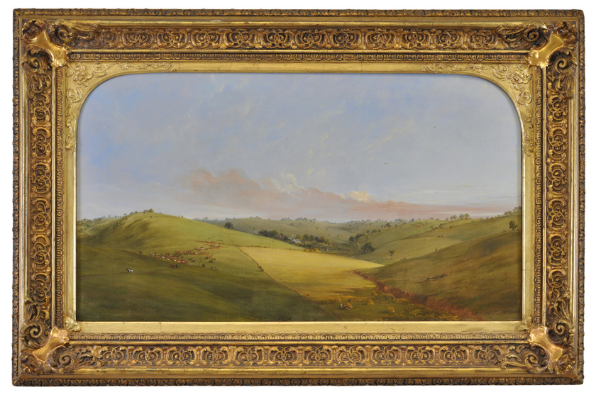 rolling grassy hills with a homestead in the distance and a flock of sheep in the foreground