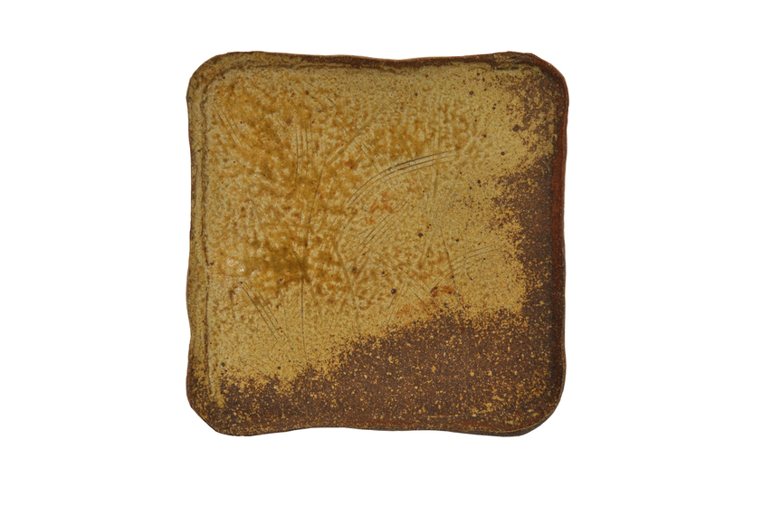 square ceramic platter with sgraffito decoration and residual ash glaze