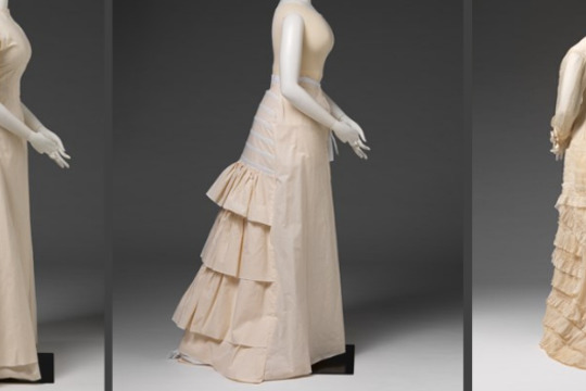a wedding dress in three stages of completion