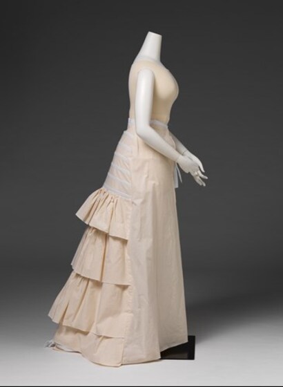 a white undergarment on mannequin displayed from side