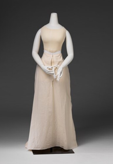 a white undergarment on mannequin shown from front