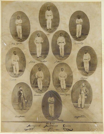 an old photo collection of 12 cricket players