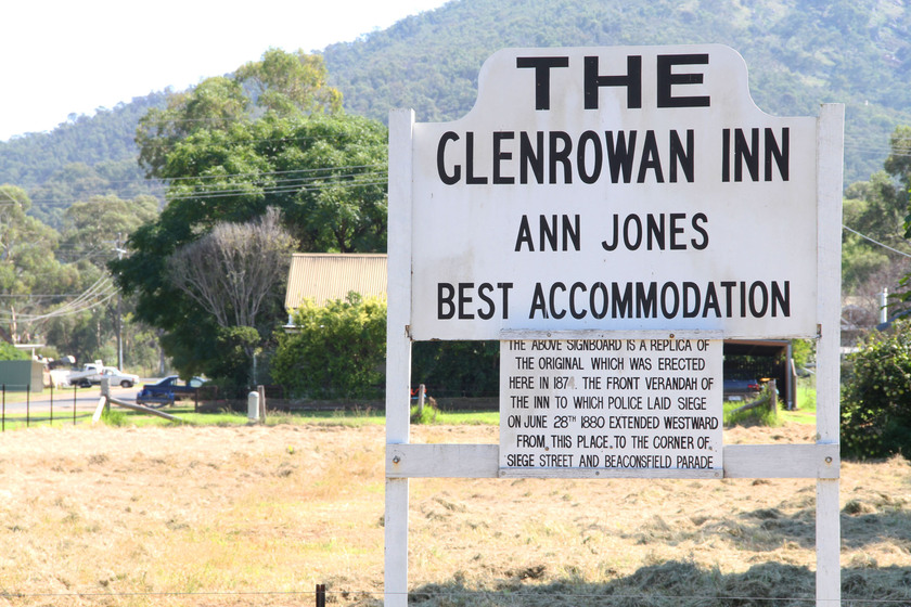 A replica signboard 'The Glenrowan Inn, Anne Jones, best accommodation' marking the where the hotel once stood.