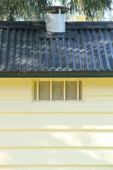 A closer view of the rear of lock up, showing ventilation shaft and corrugation roofing.