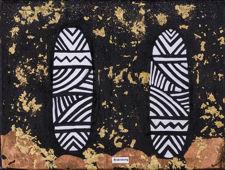 two shields with bold black and white geometric designs, both labelled 'Brabralung'  appear on a gold and black background 