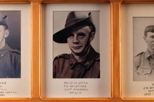Framed photographs and medals