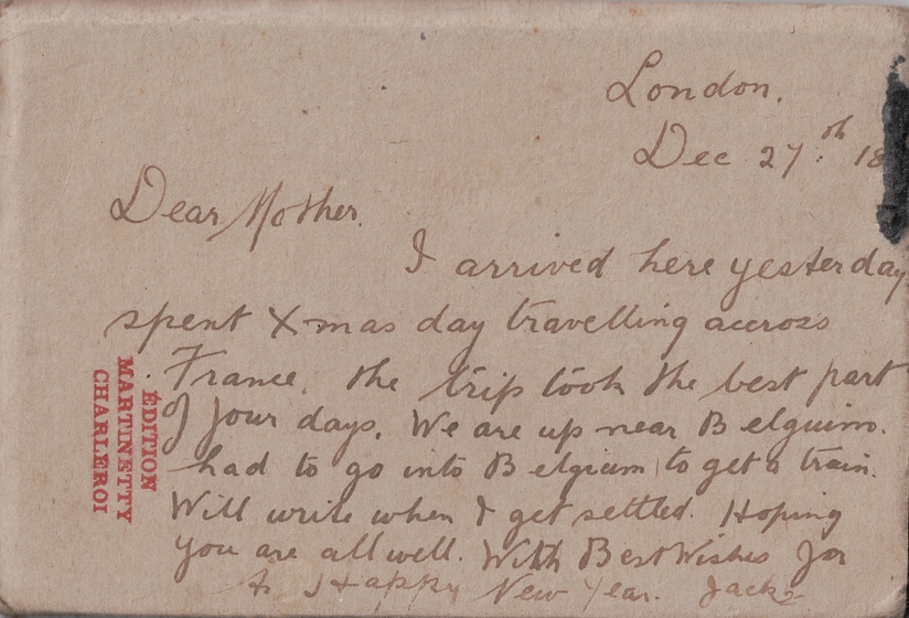 Handwritten postcard with red stamp