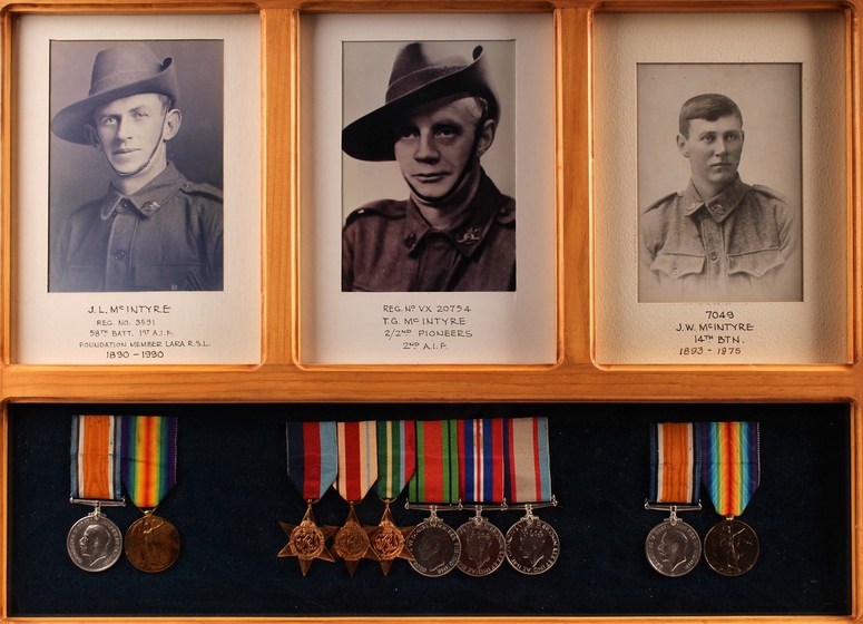 Three photographs of men framed with medals