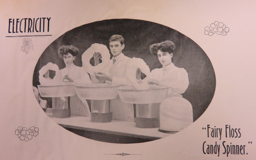 Advertisement for fairy floss candy spinner, three people in frame