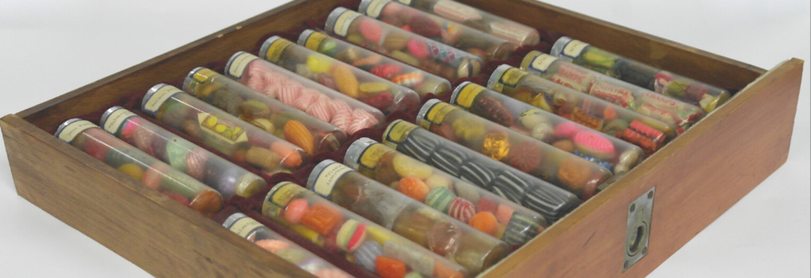 Glass tube of sweets