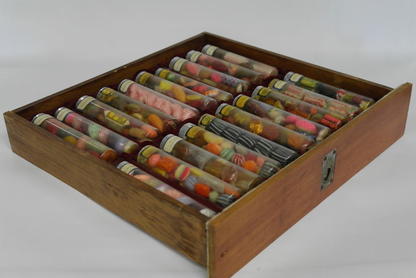 Glass tubes of lollies