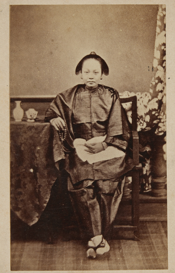 Full length portrait of a Chinese woman, seated