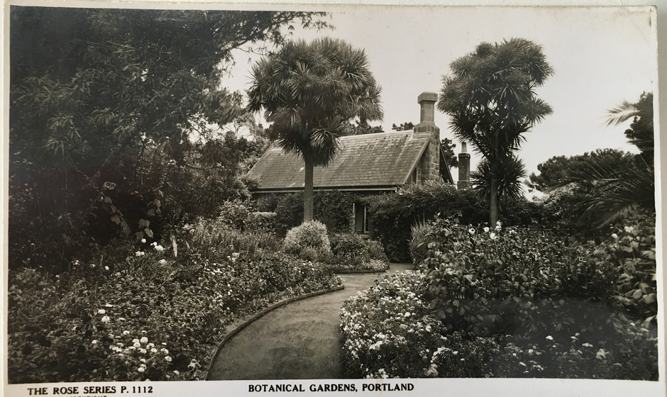 House among lush gardens
