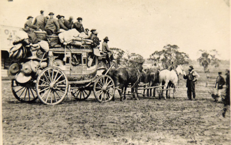 Coach loaded with people and luggage