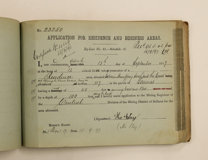 Booklet with a filled out application for residence and business areas