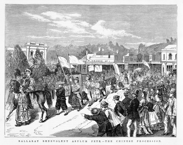 People carrying banners and walking in a procession