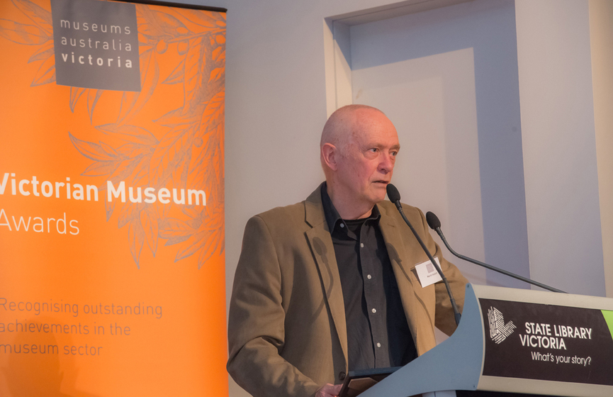 Man standing at podium