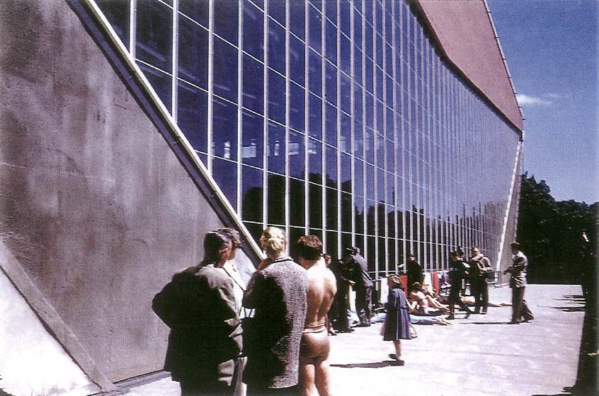 People standing out front of building