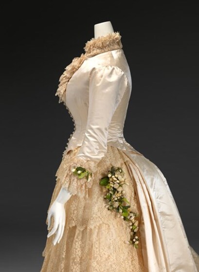 Wedding dress with flowers seen from side