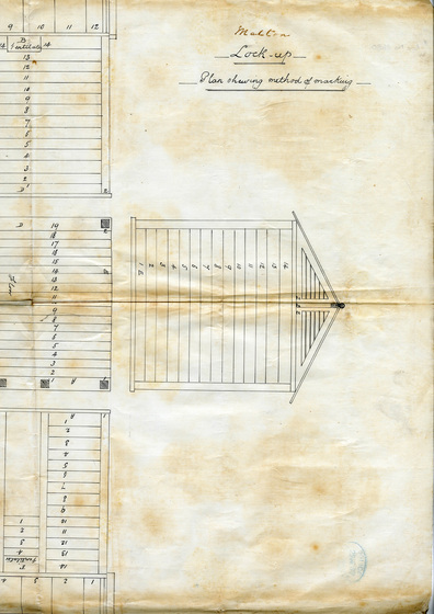 Plan with image of wooden lock-up building