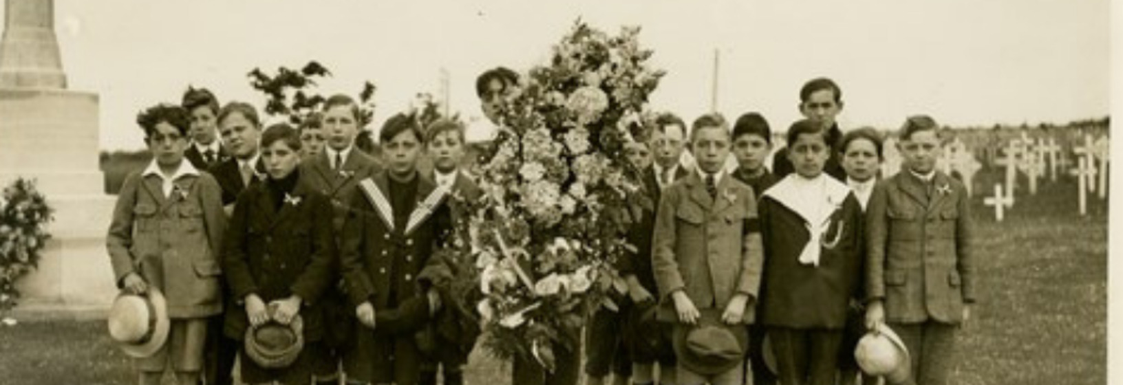 group of school children dressed in military uniform 