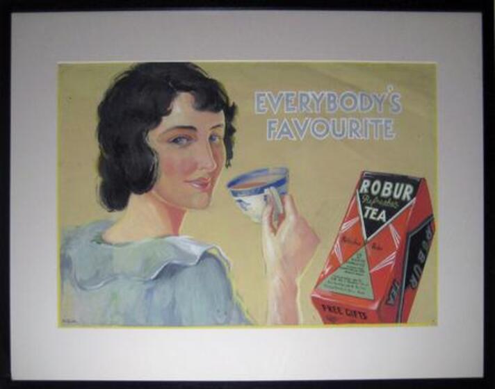 Woman holding a tea cup close to lips