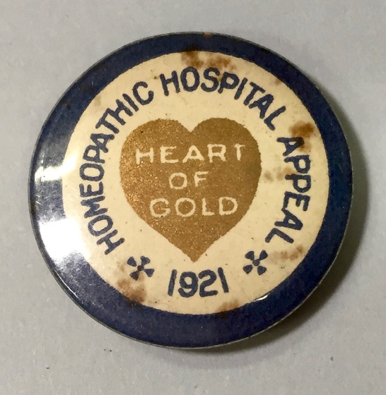 Button gold heart with blue text border