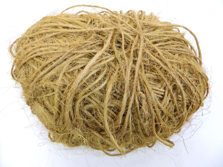 Bundle of fibrous twine beige colour