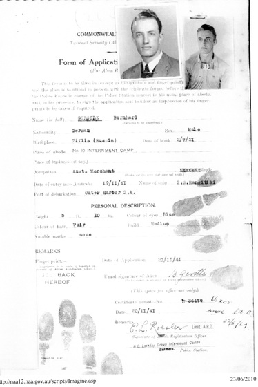Document with type, handwriting, photograph and fingerprints