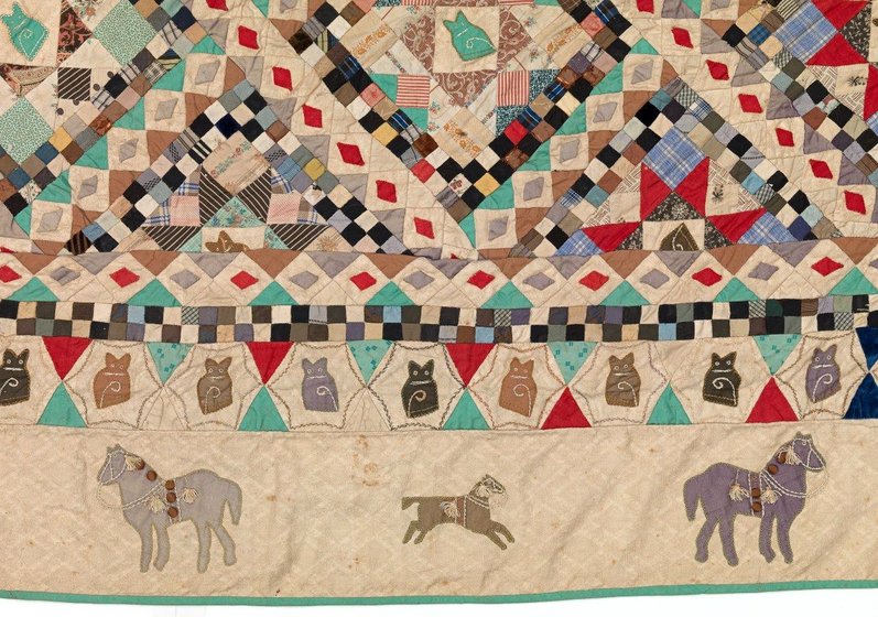 Edge of a quilt with running horses