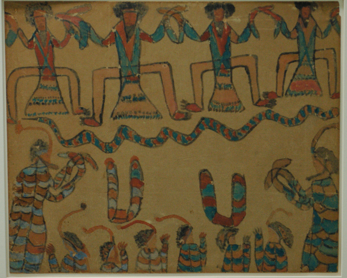 figures with boomerangs celebrate a snake
