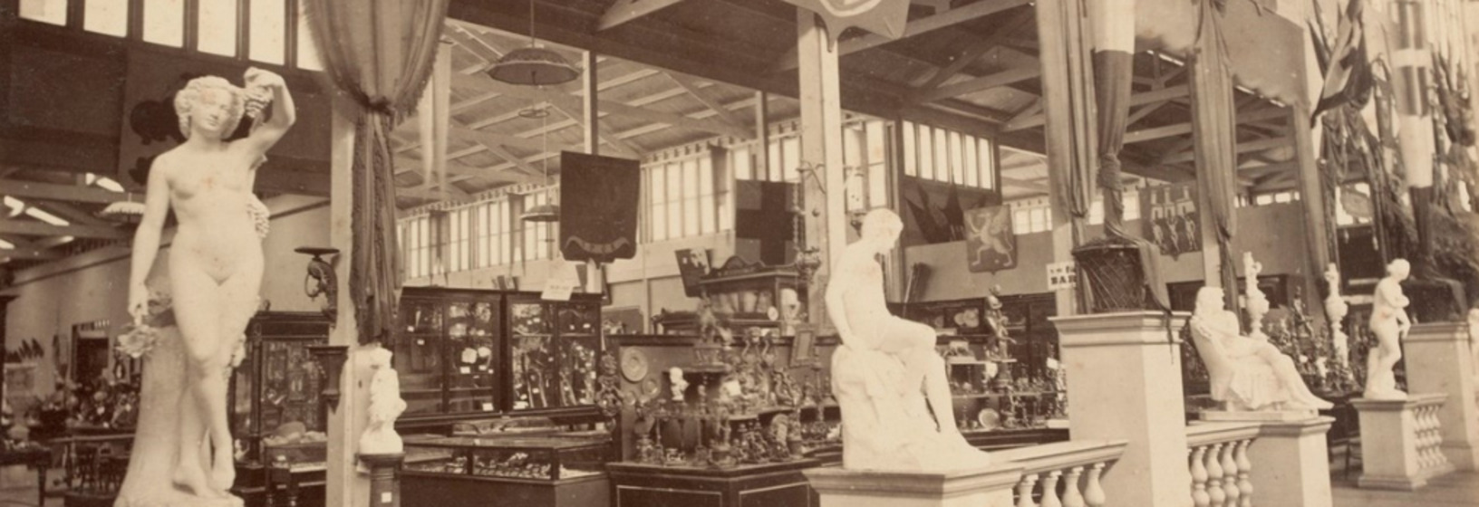 an old collection of statues and museum objects in cabinets