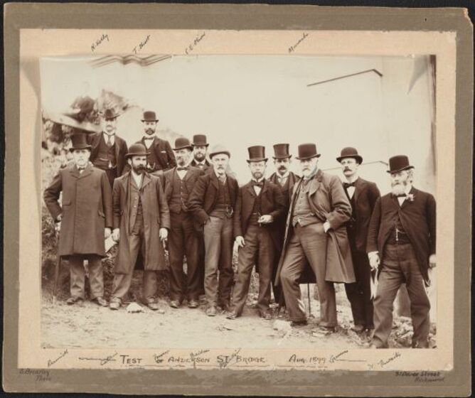 a group of men, formally dressed
