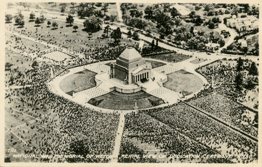 Aerial view of shrine and gardens with thousands of people attending