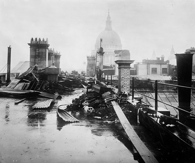 Photograph of London city skyline with bomb debris in foreground