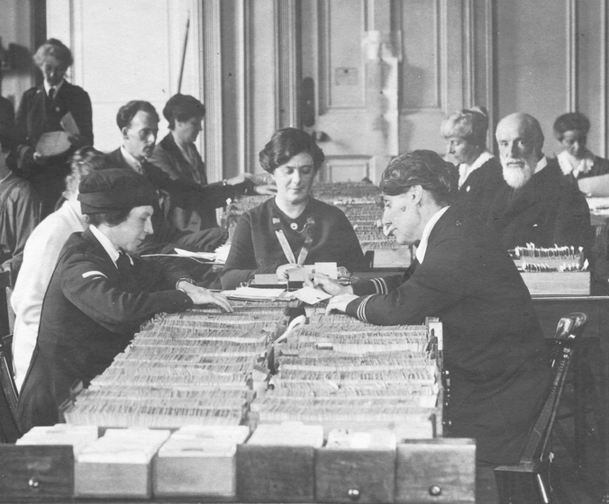 Female clerical workers at a table