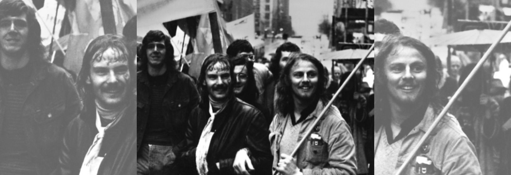 Detail of black and white photograph of demonstrators with banners in a city street, including two men arm in arm, collaged to create a banner image.