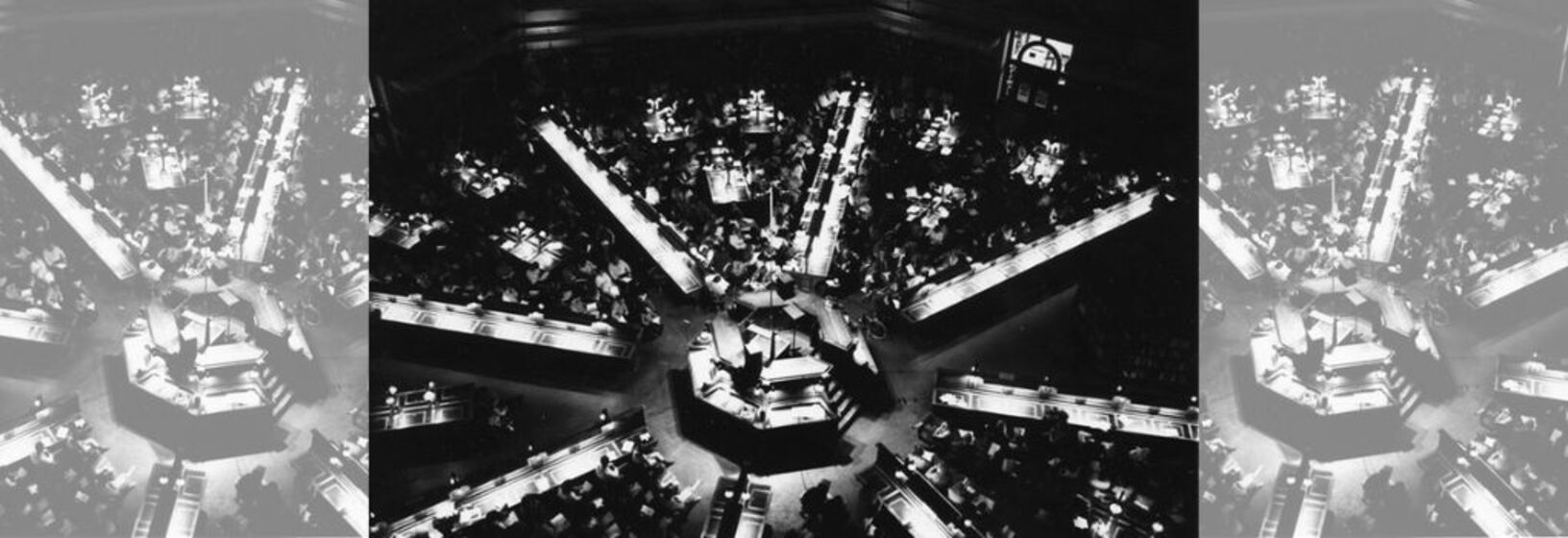 Black and white aerial image of a reading room in a large library