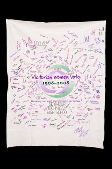 Banner with the Victorian Women Vote 1908 to 2008 logo with signatures hand written over it.