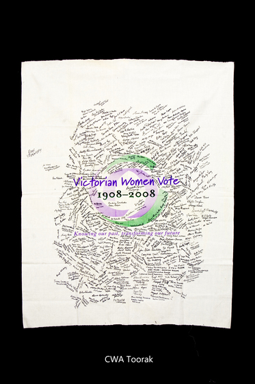Banner with the Victorian Women Vote 1908 to 2008 logo with signatures hand written over it.