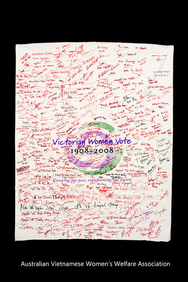 Banner with the Victorian Women Vote 1908 to 2008 logo with signatures hand written over it.