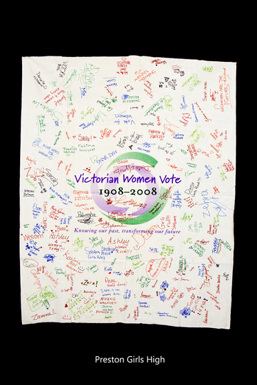 Banner with the Victorian Women Vote 1908 to 2008 logo with signatures hand written over it.