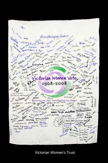 Banner with the Victorian Women Vote 1908 to 2008 logo with signatures hand written over it.