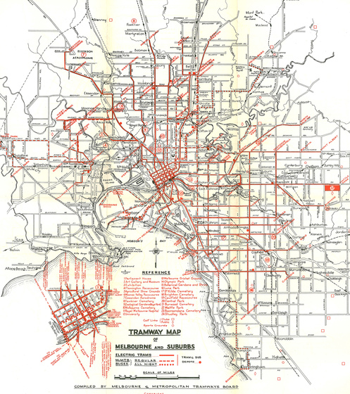 Black on white map of Melbourne main roads and features with tram and bus routes marked in red.
