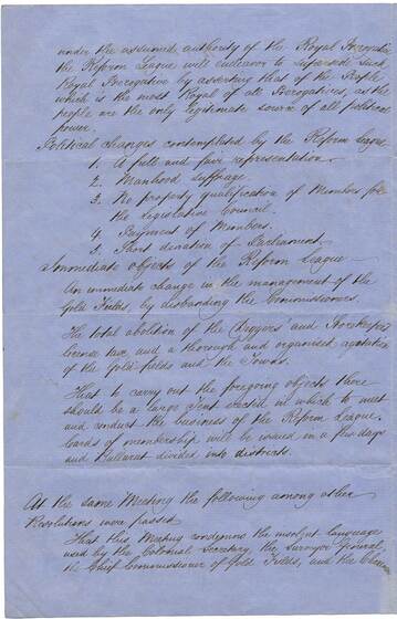Document hand written in copperplate on blue paper.