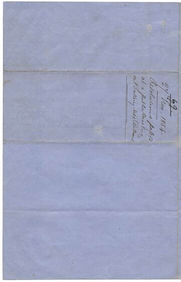 Document hand written in copperplate on blue paper.