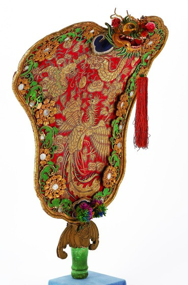 Colourful processional fan with gold embroidery and inlay.